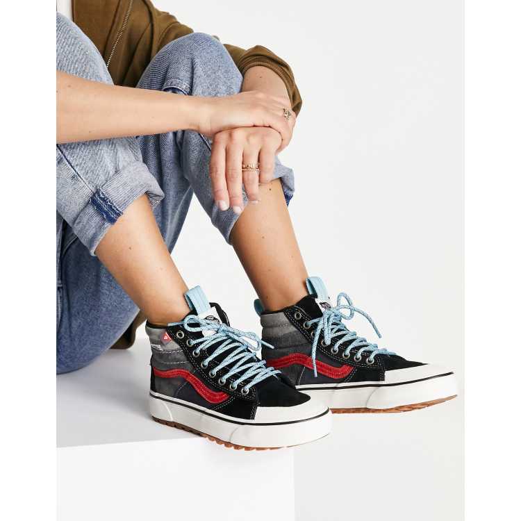 Vans arancioni store e nere