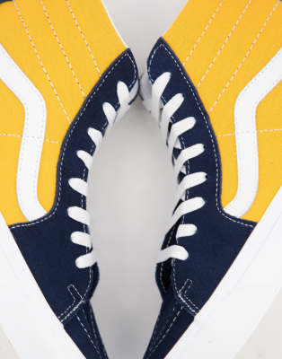 blue and yellow high top vans