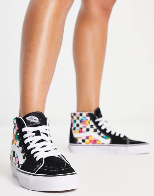 Checkerboard vans with store flowers