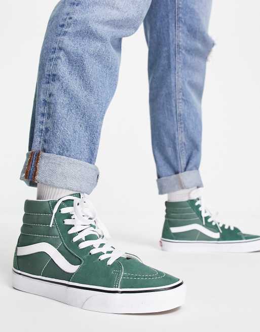 Green and white store high top vans