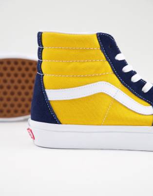 blue and yellow high top vans