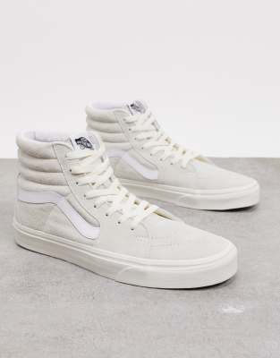 cream colored high top vans