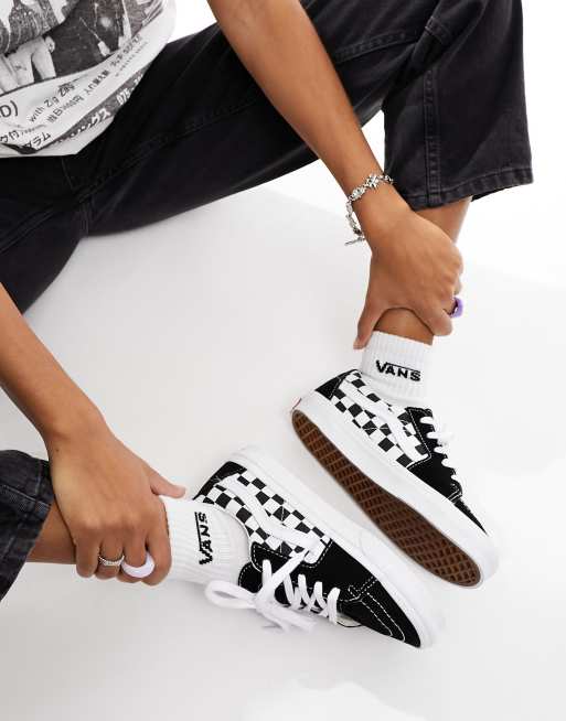 Striped shirt store with checkered vans