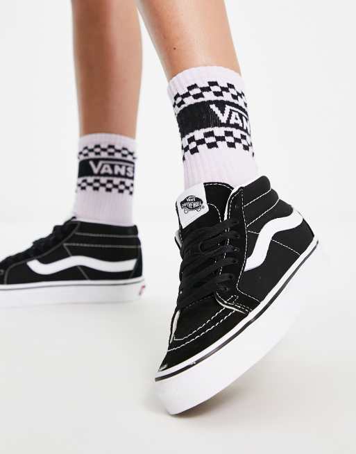 Vans haute noir store et blanche