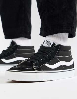 black vans mid