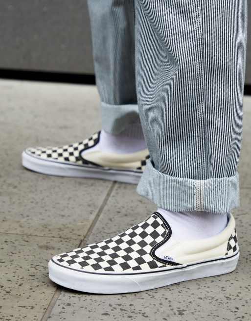 Vans Slip-On checkerboard plimsolls in black | ASOS