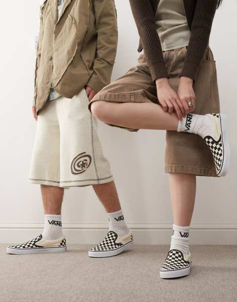 Vans - Slip-on-sneakers i sorte og hvide skaktern - view 1