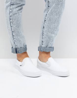 white slip on shoes vans