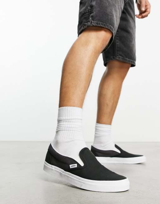 Vans slip on 2025 black on feet