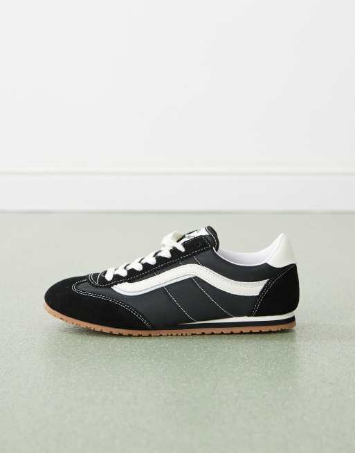 Vans Super Lowpro sneakers in black and white