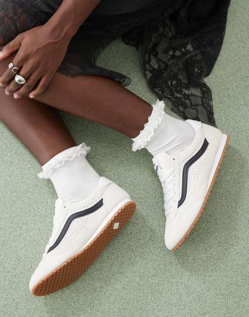 Vans Super Lowpro sneakers in white and black