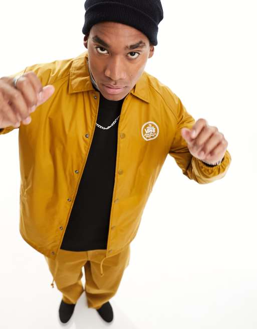 Vans – Torrey – Trainerjacke in Goldbraun