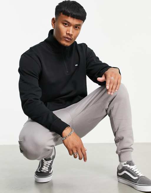 Vans Versa Standard 1/4 zip sweatshirt in black | ASOS