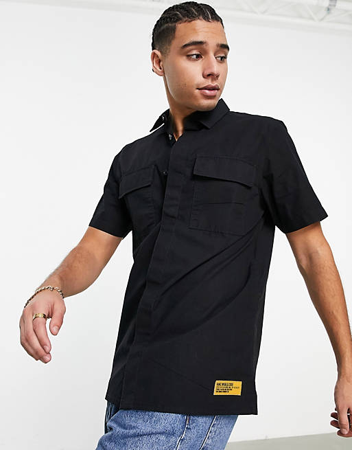Vans World Code short sleeve shirt in black