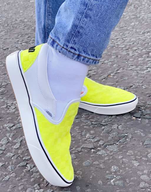 Yellow slip on store trainers