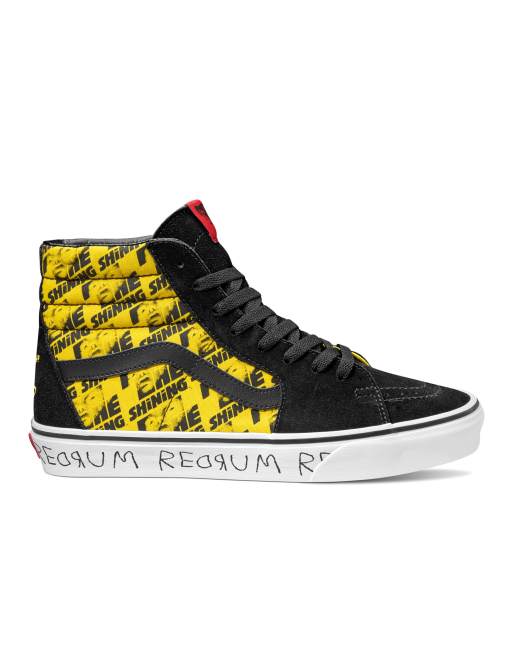 Yellow and black store high top vans