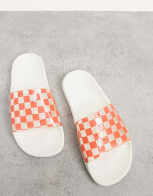 coral checkerboard vans