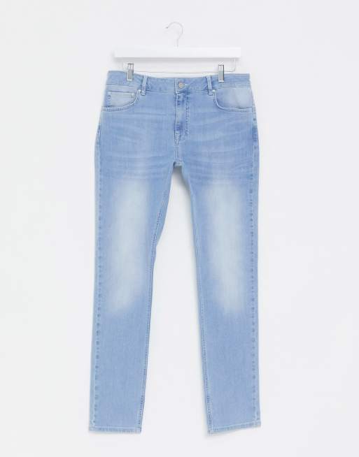 Vaqueros con tinte azul claro de ASOS DESIGN | ASOS
