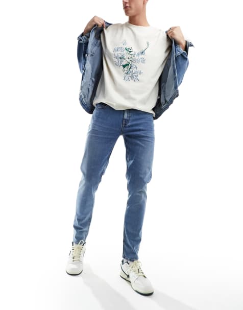 Vaqueros ajustados en azul lavado medio de ASOS DESIGN - view 1
