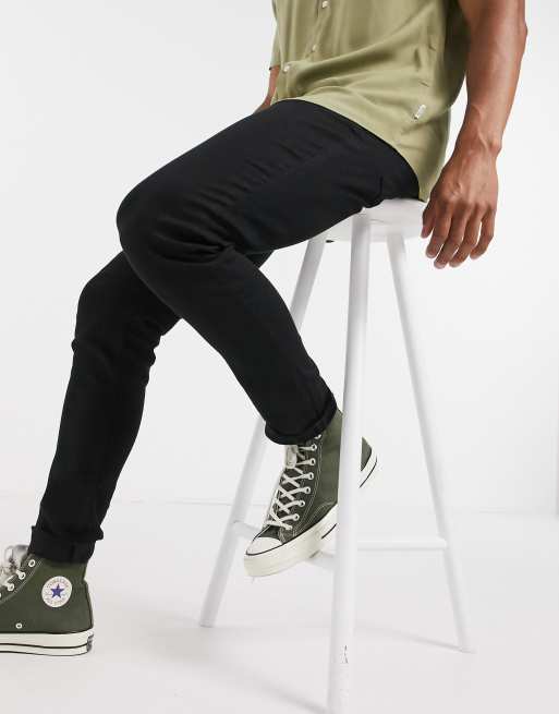 Vaqueros ajustados en negro de River Island, 4 de 4