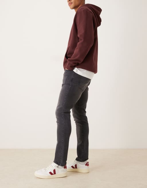 Vaqueros ajustados en negro desgastado de ASOS DESIGN, 2 de 5