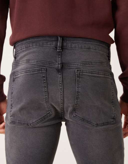 Vaqueros ajustados en negro desgastado de ASOS DESIGN, 5 de 5