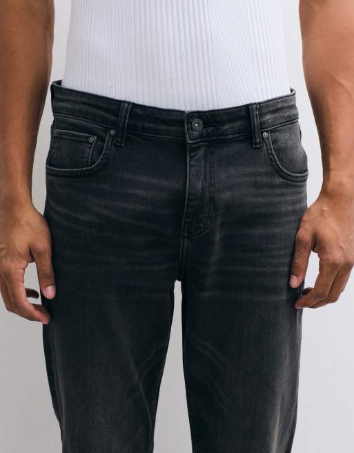 Vaqueros ajustados en negro desgastado de ASOS DESIGN, 5 de 5