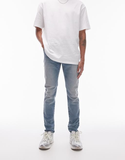 Vaqueros azul claro de corte pitillo de Topman