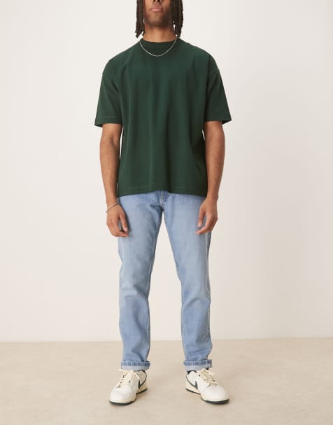 Vaqueros azul claro de corte tapered de Mango - view 1