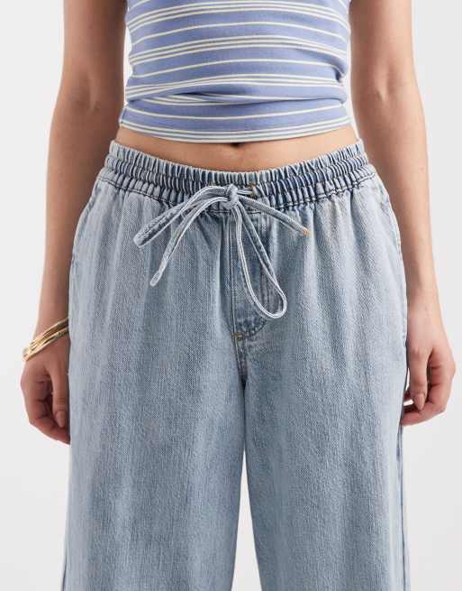 Vaqueros azul claro de pernera ancha y talle medio con lazada en la cintura de Pieces, 4 de 5