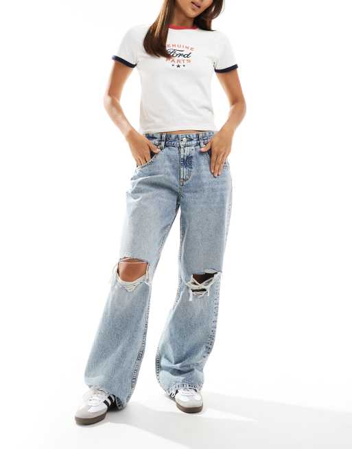 Vaqueros azul claro holgados con lavado envejecido y rodillas rasgadas de ASOS DESIGN