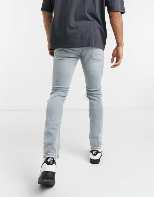 Vaqueros azul claro lavado de corte pitillo con rodillas rasgadas de Topman, 2 de 4