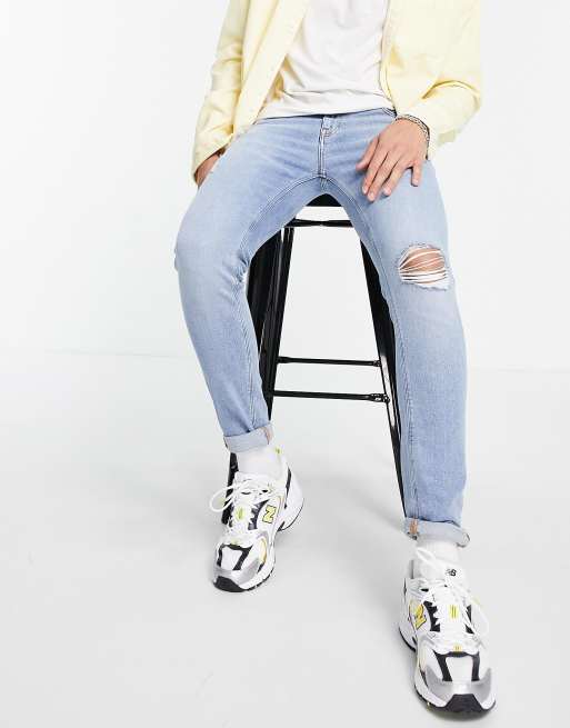 Vaqueros azul claro rasgados de corte pitillo de ASOS DESIGN 