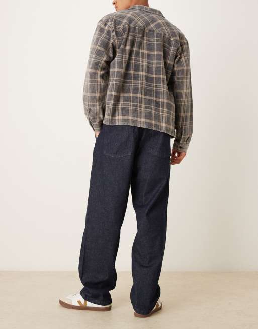 Vaqueros azul crudo holgados con cintura elástica y cordón ajustable en el interior de ASOS DESIGN, 2 de 5