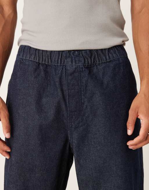 Vaqueros azul crudo holgados con cintura elástica y cordón ajustable en el interior de ASOS DESIGN, 5 de 5