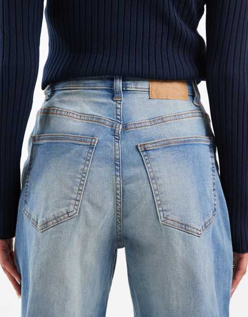 Vaqueros azul ilusión elásticos de pernera ancha curvada de Cotton On, 5 de 5