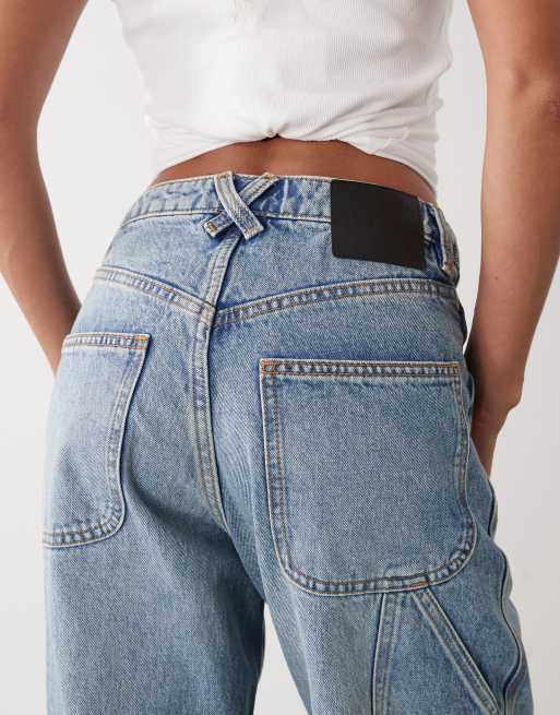 Vaqueros azul lavado de pernera ancha y estilo worker Fever de Monki, 4 de 5