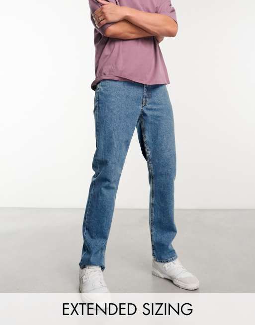 Vaqueros azul lavado medio de corte slim elástico de ASOS DESIGN