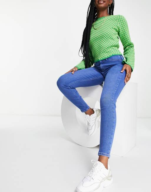 Vaqueros azul luminoso pitillo con diseño moldeador Molly de River Island