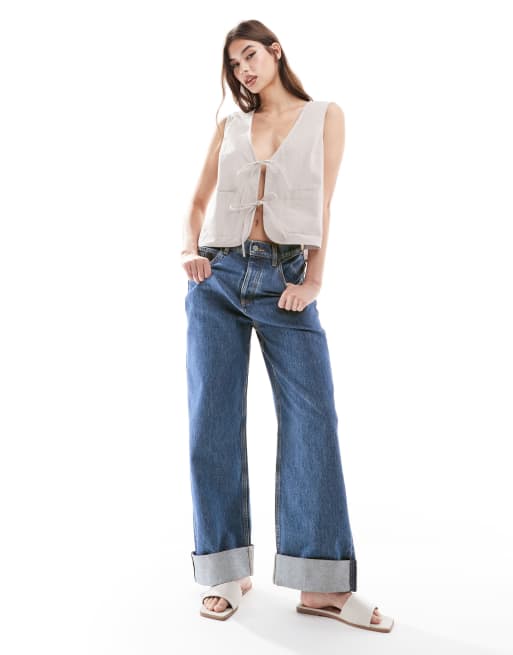Vaqueros azul medio de corte suelto con dobladillos anchos de ASOS DESIGN