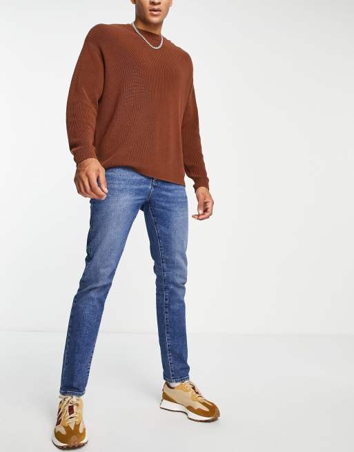 Vaqueros azul medio lavado elásticos de corte slim de 12,5 oz de ASOS DESIGN