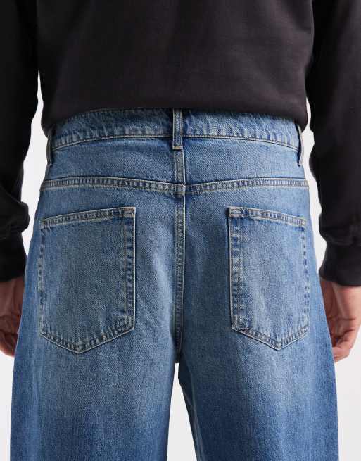 Vaqueros azul medio lavados y holgados de ASOS DESIGN, 4 de 5