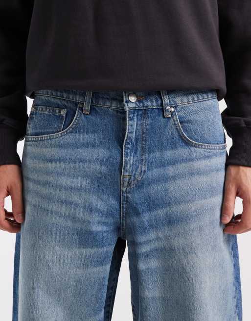 Vaqueros azul medio lavados y holgados de ASOS DESIGN, 5 de 5