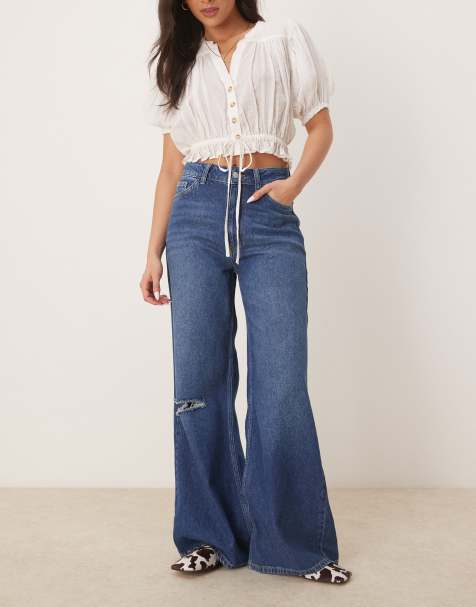 Vaqueros azul medio luminoso de pernera ancha con diseño rasgado de denim suave de ASOS DESIGN - view 1