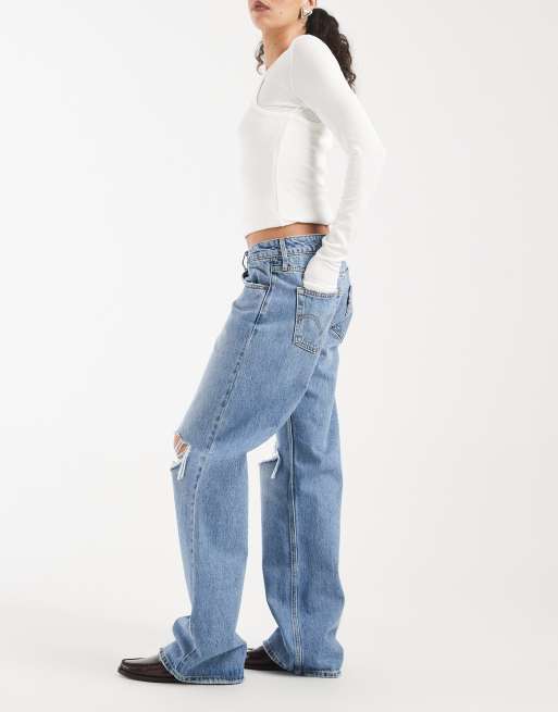 Vaqueros azul medio rasgados de corte suelto y talle bajo de Levi's , 3 de 5