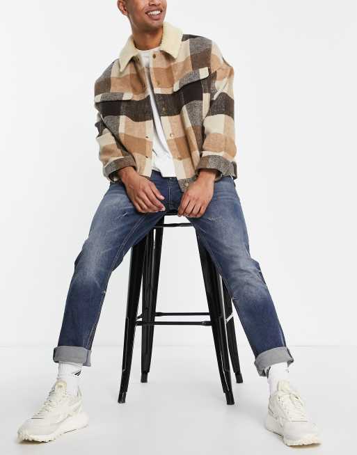 Vaqueros azul oscuro de corte slim de River Island