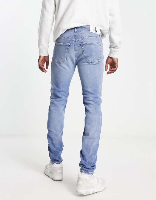 Vaqueros azules con lavado medio vintage de corte pitillo de