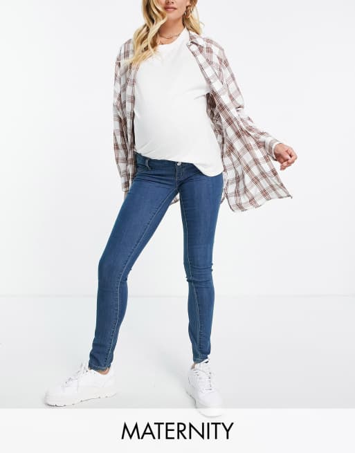 Vaqueros azules de corte pitillo de Mamalicious Maternity