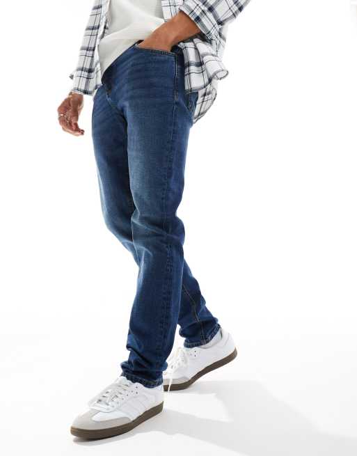 Vaqueros azules de corte slim con lavado medio de River Island