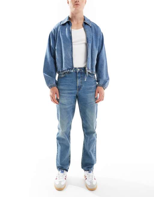 Vaqueros azules de corte tapered con lavado medio de ASOS DESIGN